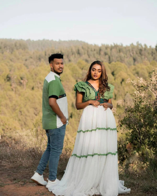 Habesha Elegance: Green Design in Couples' Outfit.