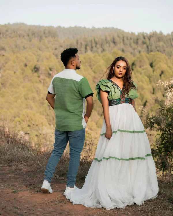 Habesha Elegance: Green Design in Couples' Outfit.