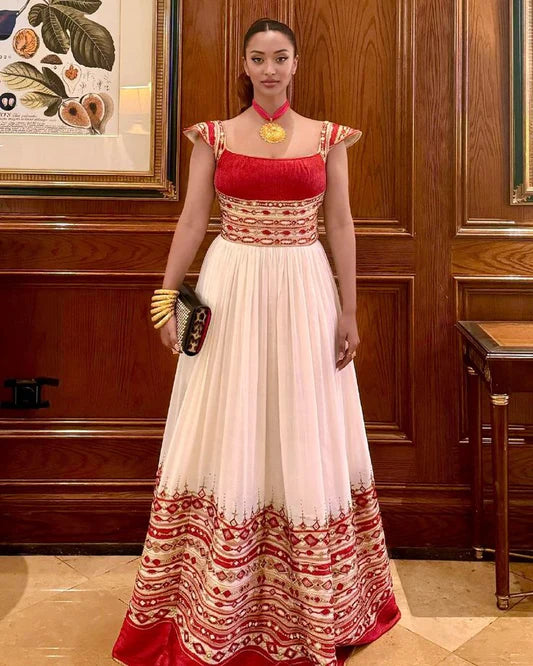 Traditional Habesha dress features handcrafted golden embroidery, ideal for significant events