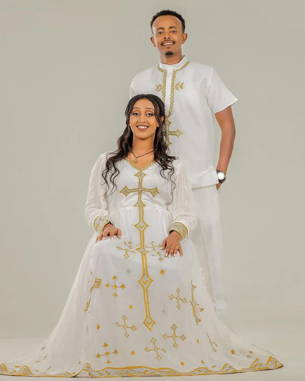 Golden Cross Design: Habesha Couples Outfit for Weddings and Special Occasions.