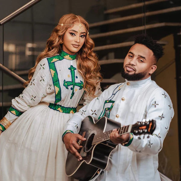 Harmony in Green: Habesha Cultural Bliss with Couples' Outfit.