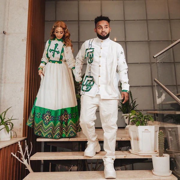 Harmony in Green: Habesha Cultural Bliss with Couples' Outfit.