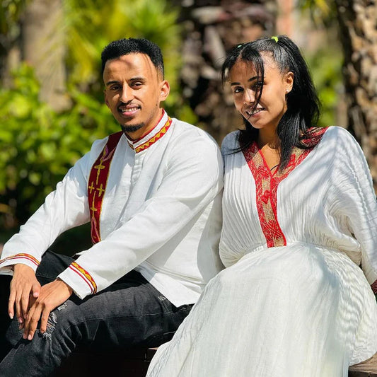 Timeless Unity: Simple Red Menen Habesha Couples' Ensemble.