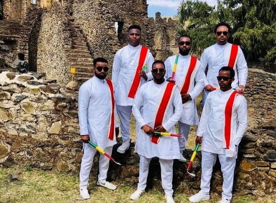 Jano: Crimson Tilet Sophistication in Habesha Men's Attire