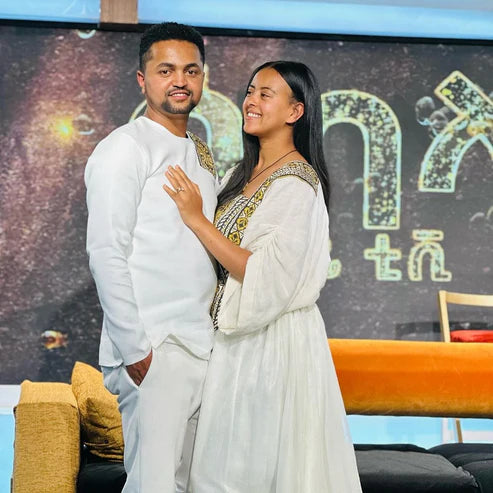 Exquisite Unity: Detailed Habesha Couples' Outfit.