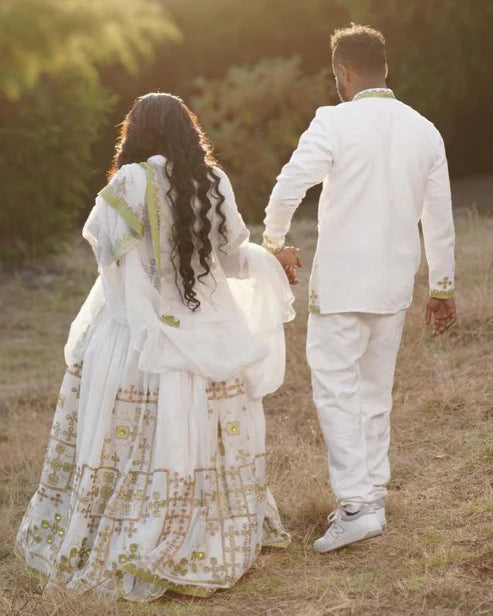 Eternal Elegance: Habesha Couples Wedding Ensemble.