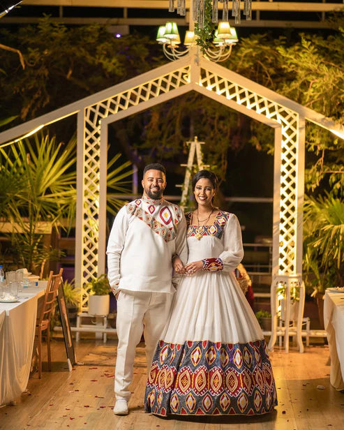 Ethereal Elegance: The Majestic Habesha Wedding Ensemble.