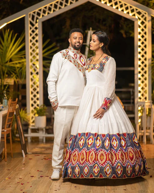 Ethereal Elegance: The Majestic Habesha Wedding Ensemble.