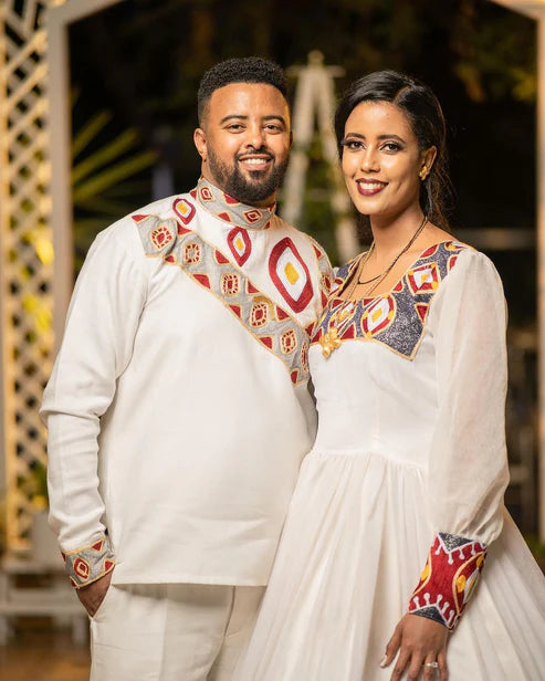 Ethereal Elegance: The Majestic Habesha Wedding Ensemble.