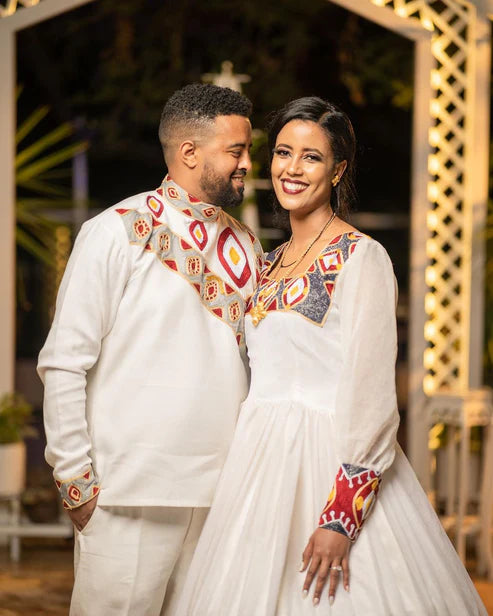 Ethereal Elegance: The Majestic Habesha Wedding Ensemble.