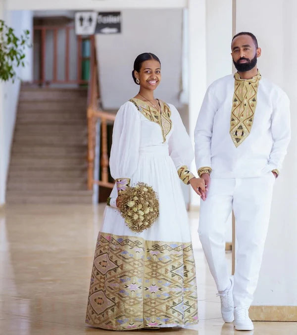 Contemporary Splendor: Modern Elegance in Habesha Couples Wedding Attire.