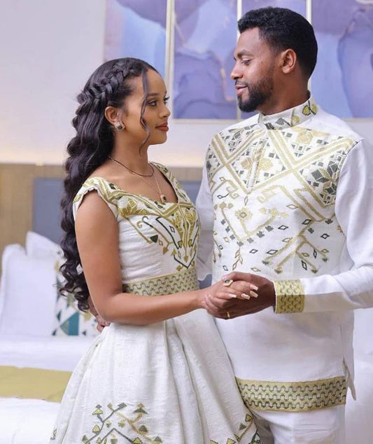 Eternal Radiance: Graceful in Habesha Couples Wedding Attire.