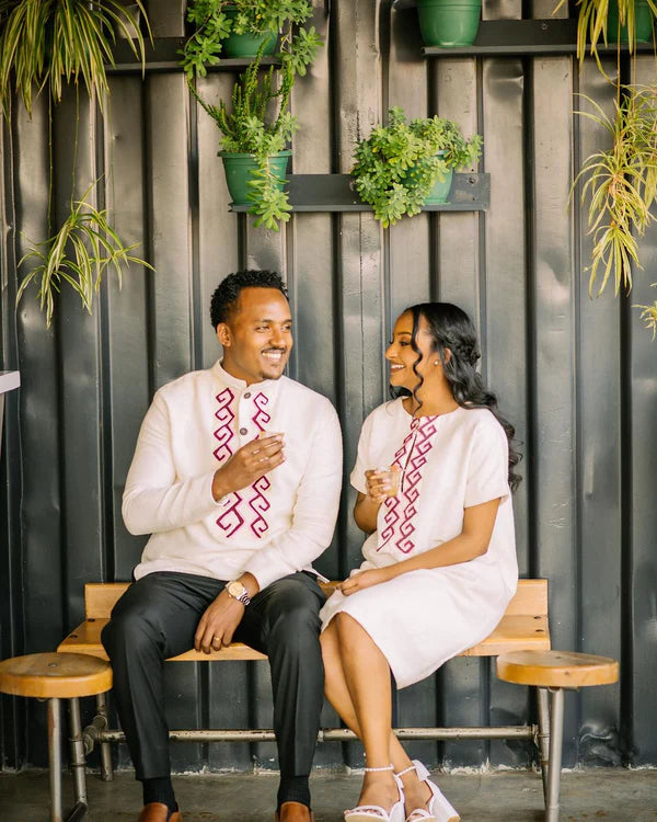 Regal Simplicity: Habesha Couples Outfit in Purple Fetil.