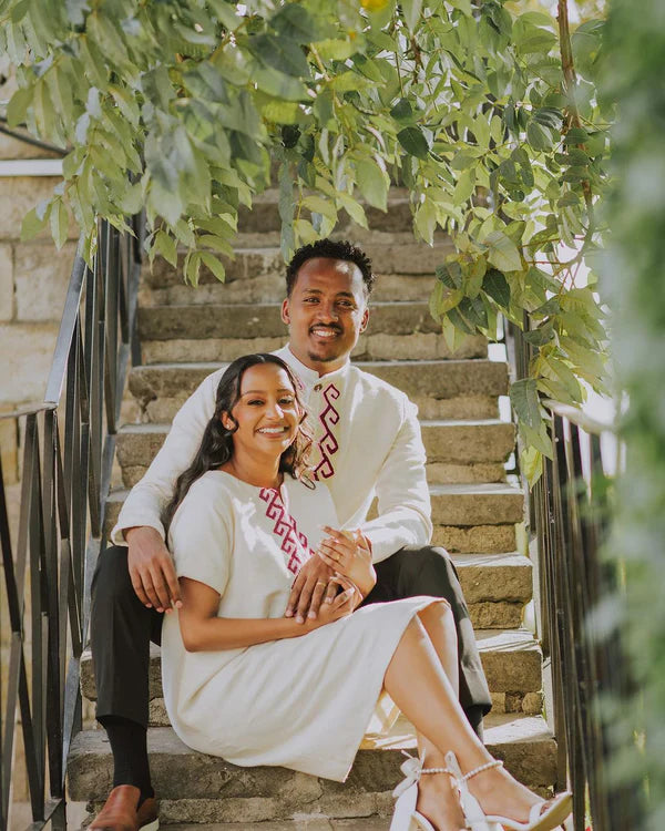 Regal Simplicity: Habesha Couples Outfit in Purple Fetil.