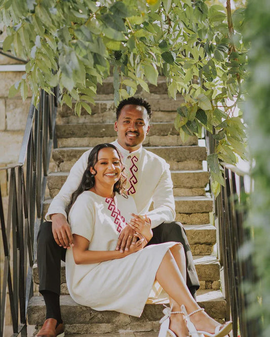 Regal Simplicity: Habesha Couples Outfit in Purple Fetil.