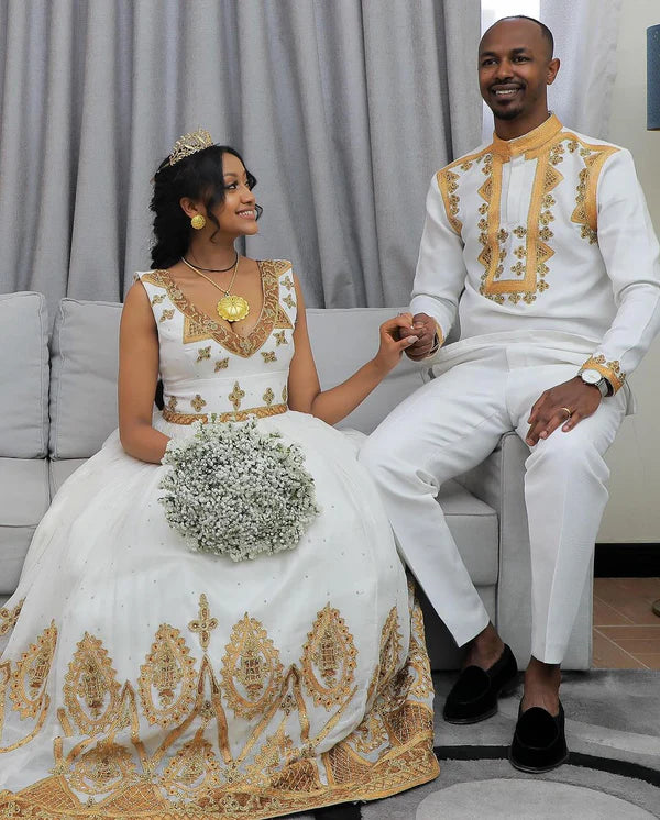 Habesha Elegance Unveiled: Stunning Wedding Attire for Couples.