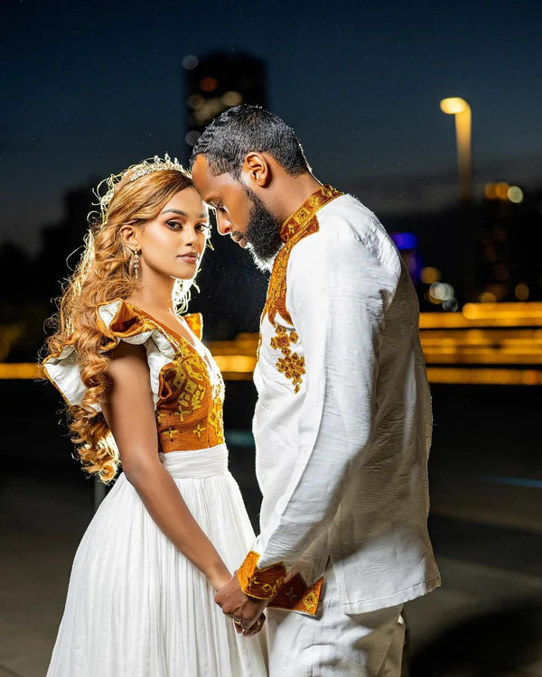 Vibrant Splendor Habesha Couples Outfit: Classy Habesha Wedding Attire.
