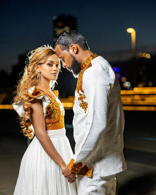 Vibrant Splendor Habesha Couples Outfit: Classy Habesha Wedding Attire.