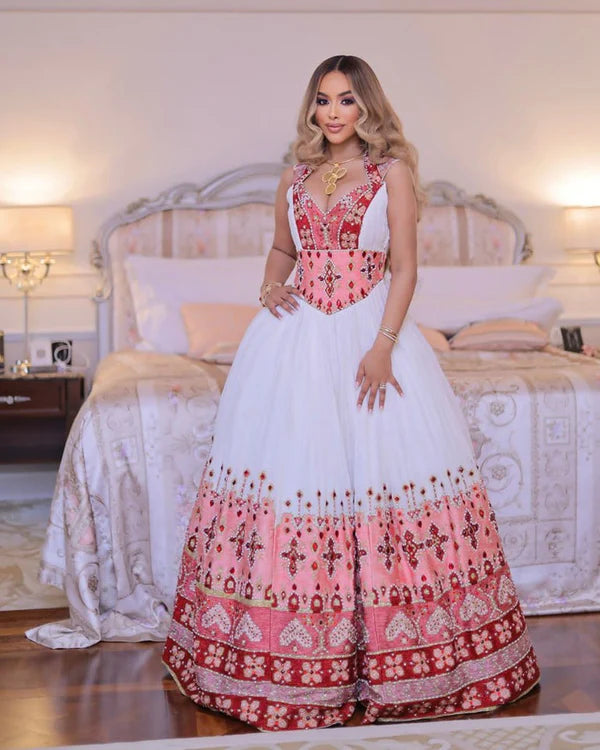 Elegant Pink and Multicolored Habesha Wedding Dress: Cross Adornments, Beautiful Habesha Style