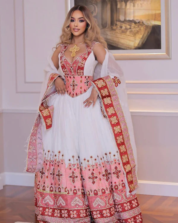 Elegant Pink and Multicolored Habesha Wedding Dress: Cross Adornments, Beautiful Habesha Style