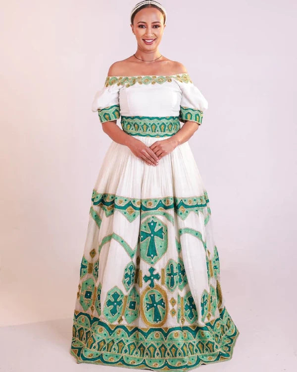 Stylish Green Habesha Wedding Dress: A Modern Off-Shoulder Habesha Design.