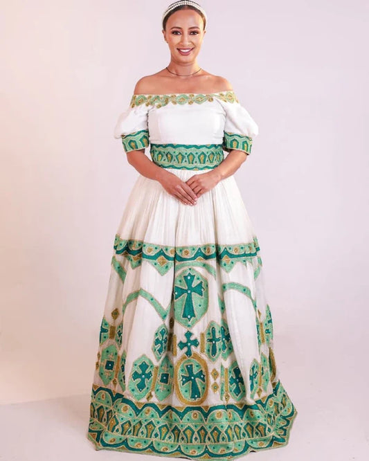 Stylish Green Habesha Wedding Dress: A Modern Off-Shoulder Habesha Design.
