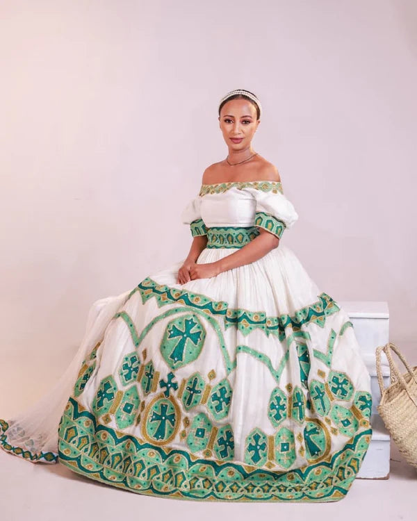 Stylish Green Habesha Wedding Dress: A Modern Off-Shoulder Habesha Design.