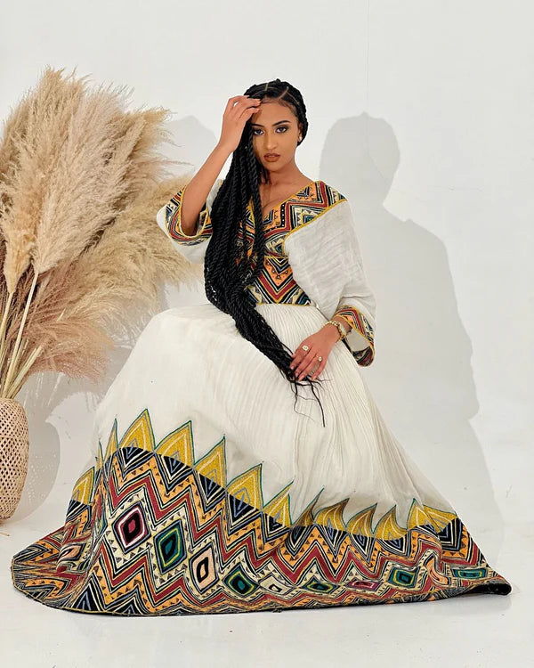 Vibrant Habesha Kemis features captivating designs and is ideal for cultural events and celebrations