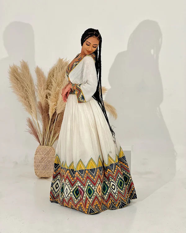 Vibrant Habesha Kemis features captivating designs and is ideal for cultural events and celebrations