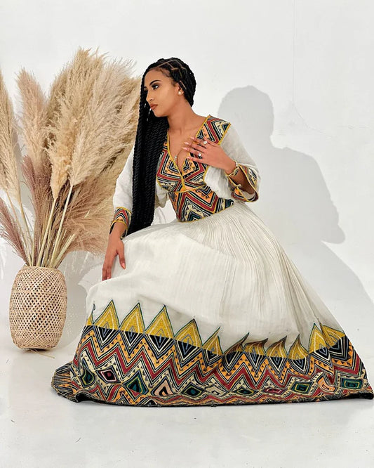 Vibrant Habesha Kemis features captivating designs and is ideal for cultural events and celebrations