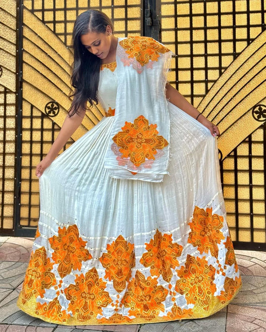 Adorned with diamond-shaped embroidery, is perfect for church and holidays