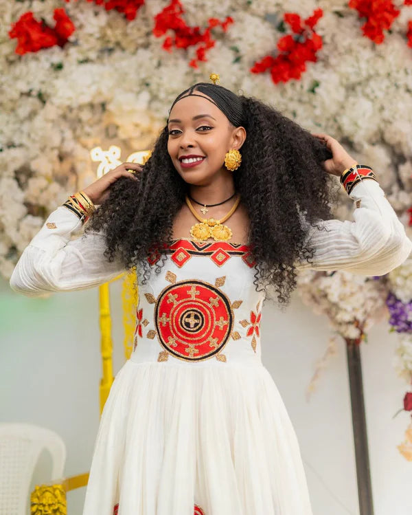 Beautiful Red Habesha Wedding Dress: Adorned with wide, dazzling embellishments