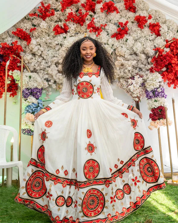 Beautiful Red Habesha Wedding Dress: Adorned with wide, dazzling embellishments