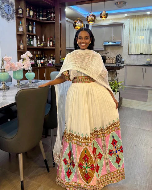 This exquisite Habesha dress beautifully showcases the richness of Ethiopian culture