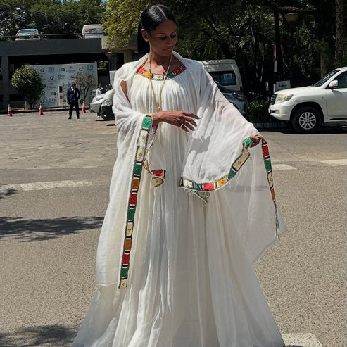 Beautiful Vintage White Habesha Dress: Thin Handmade Embroidery.