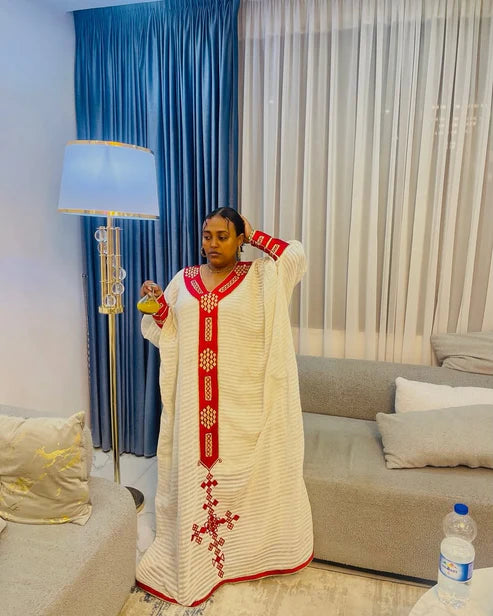 Timeless Cultural Red Ethiopian Dress: Golden Cross Embroidery.