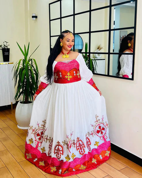 Classic Off-Shouldered Pink and Red Habesha Dress: Golden Cross Embellishments.